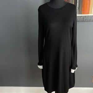 Tahari black soft knit crew neck sweater midi. Layered white woven ruffle cuffs.